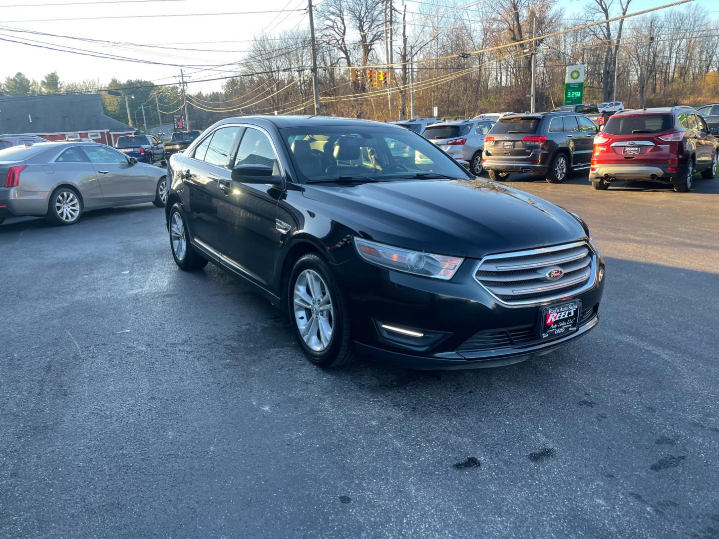 2013 Black /Black Ford Taurus SEL FWD (1FAHP2E85DG) with an 3.5L V6 DOHC 24V engine, 6-Speed Automatic transmission, located at 547 E. Main St., Orwell, OH, 44076, (440) 437-5893, 41.535435, -80.847855 - Photo#2